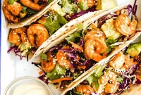Crispy Shrimp Tacos with Tangy Slaw and Lime crema