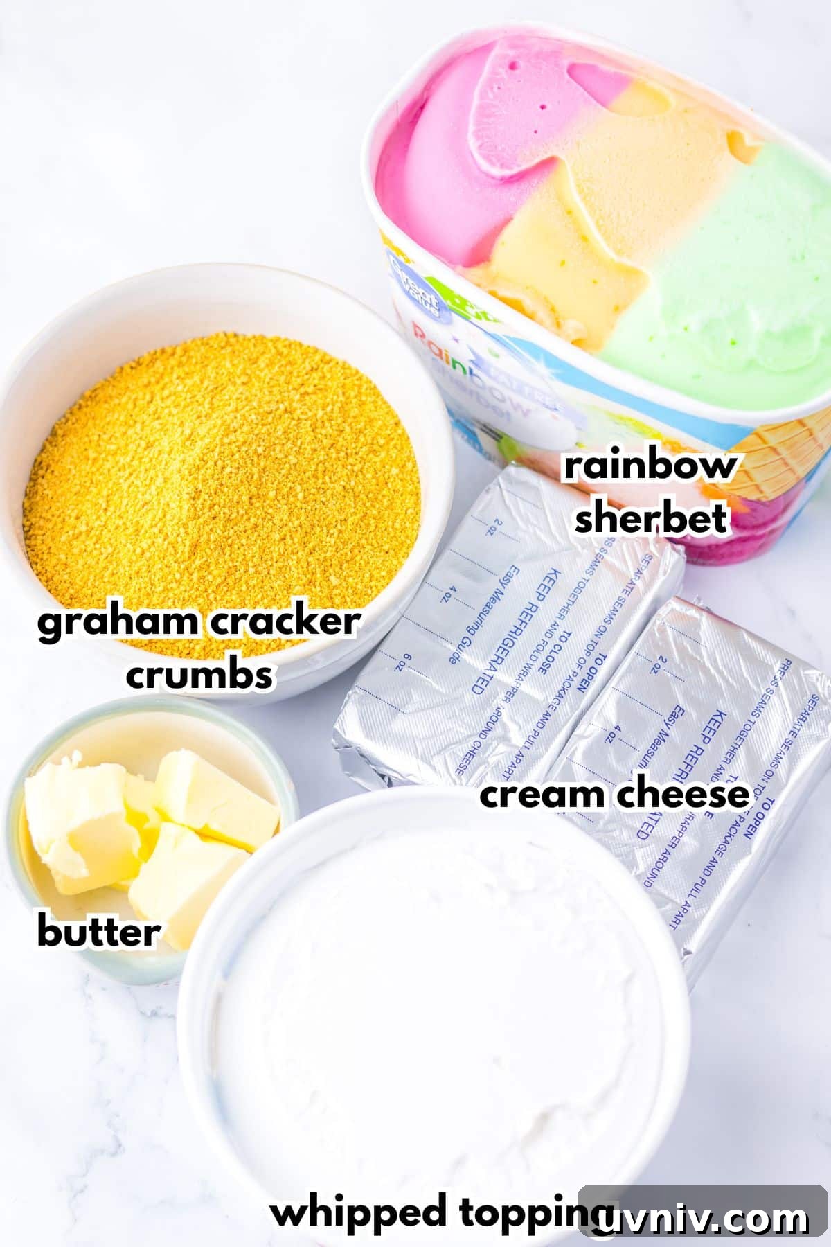 No-Bake Rainbow Sherbet Dessert Bars 4 Bowls of ingredients labelled with text on a counter.