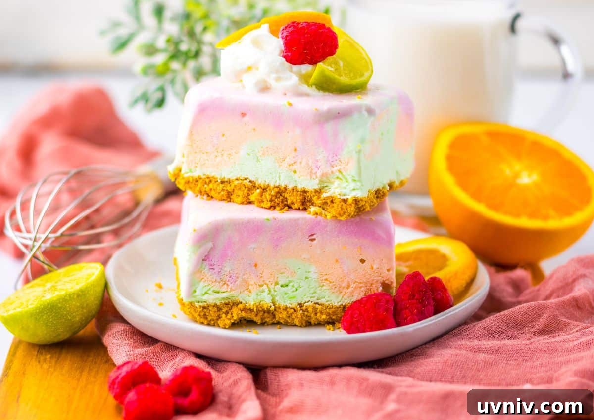 No-Bake Rainbow Sherbet Dessert Bars 9 Two rainbow sherbet bars stacked on top of each other.
