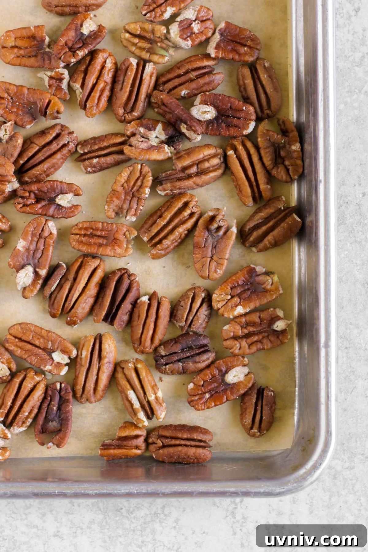 Wild Rice Salad with Cranberries & Pecans — Chilled Side Dish 6 Roasted pecans on a baking sheet.