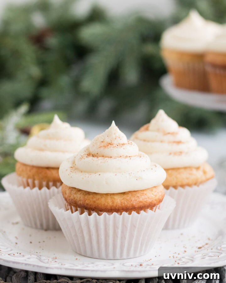 Egg Nog Cupcakes recipe: three egg nog cupcakes on a plate.
