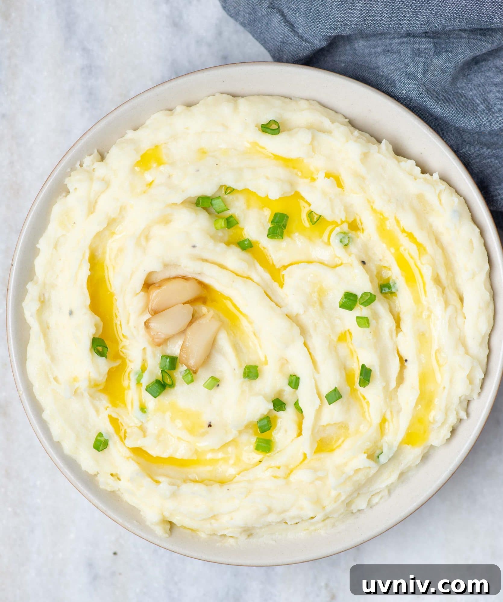 mashed potato elevates everyday mash with the flavor of roasted garlic to a divine side dish to any meat.