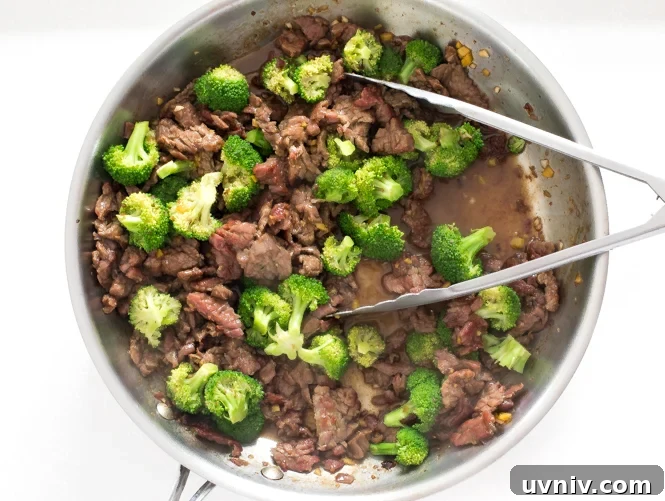 Quick Beef and Broccoli Stir-Fry in 20 Minutes 6 tossing beef and broccoli in sauce