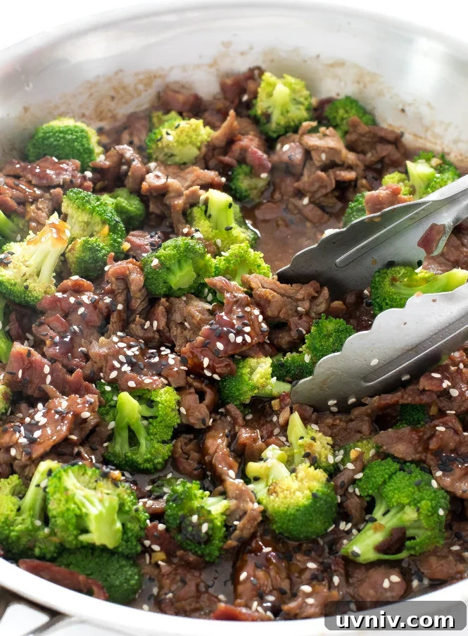 Authentic Beef and Broccoli | chefsavvy.com beef and broccoli in large skillet