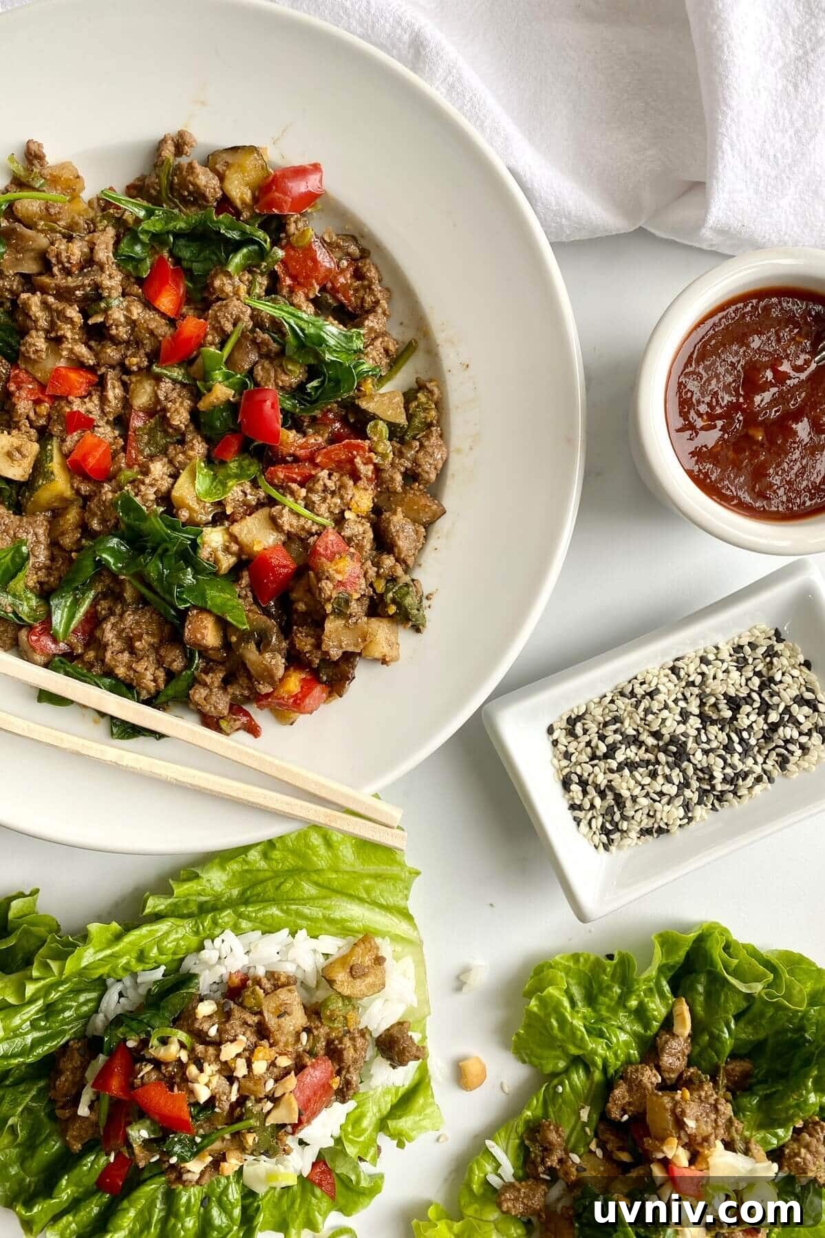 Savory Ground Beef Lettuce Wraps with Zesty Asian Sauce 4 beef and veggie filling for lettuce wraps.