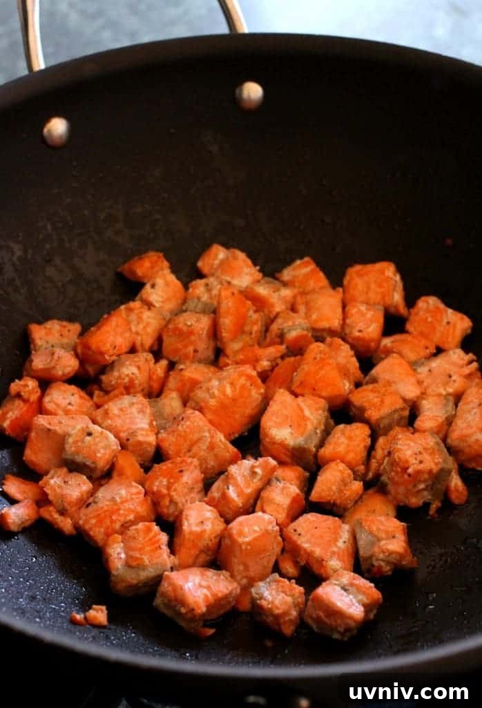 Quick Salmon Noodle Bowl Recipe for Weeknight Dinners 3 Salmon in wok for Salmon Noodle Bowl