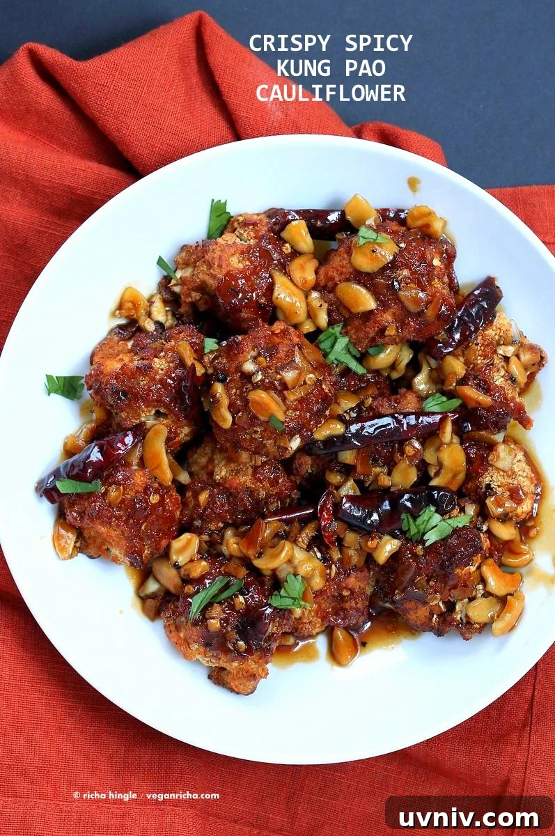 Crispy Spicy Kung Pao Cauliflower Recipe for Dinner 3 Crispy Kung Pao Cauliflower. Cauliflower battered and baked and tossed in spicy kung pao sauce.