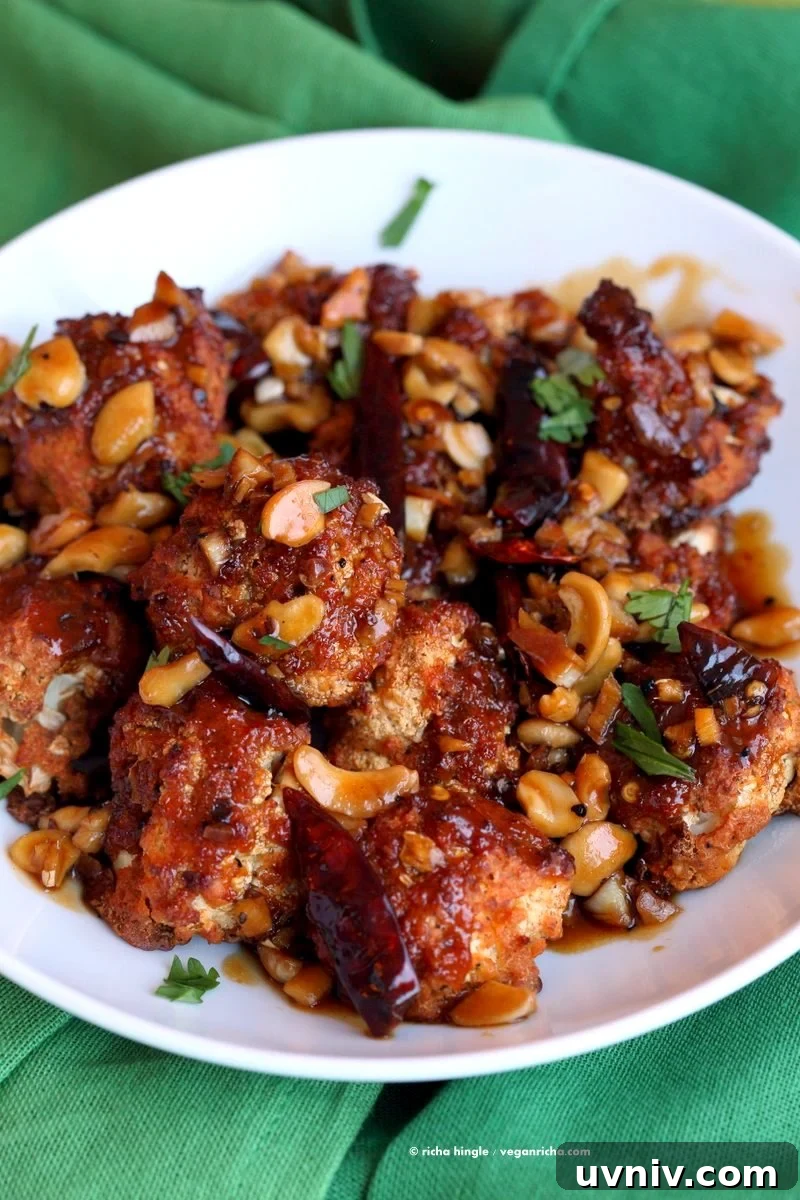 Crispy Spicy Kung Pao Cauliflower Recipe for Dinner 5 Crispy Kung Pao Cauliflower. Cauliflower battered and baked and tossed in spicy kung pao sauce.
