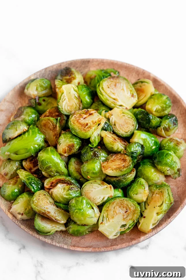 Crispy Sautéed Brussels Sprouts with Garlic and Parmesan 2 Photo of a plate of sauteed Brussels sprouts