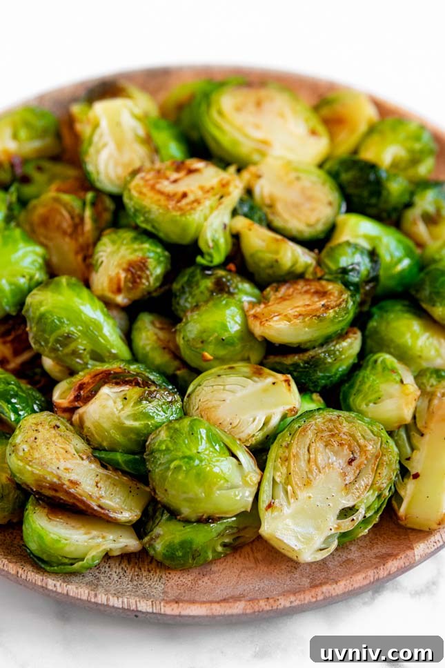 Crispy Sautéed Brussels Sprouts with Garlic and Parmesan 4 Close-up shot of a plate of sauteed Brussels sprouts