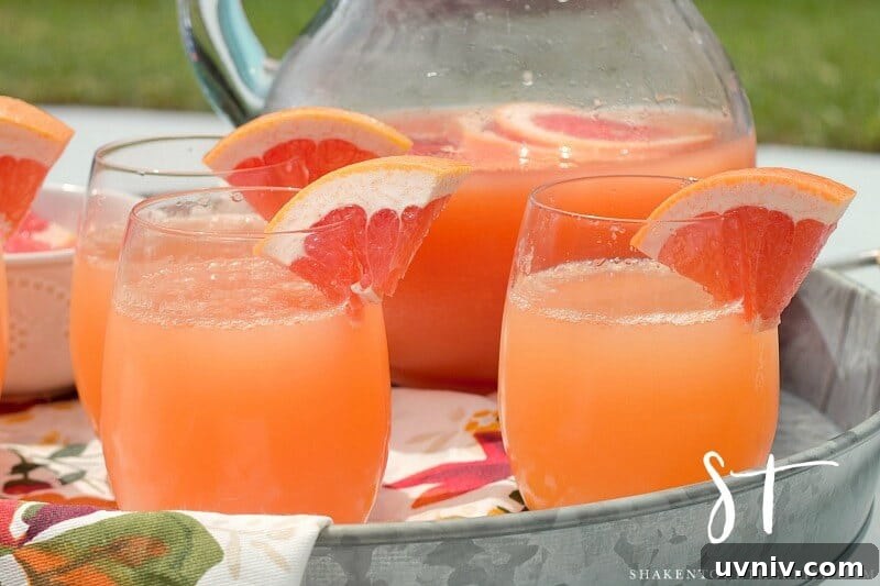 Bright and bubbly, these Ruby Red Grapefruit Mimosas will be the life of the party! This easy 2 ingredient cocktail recipe is perfect for pool parties, a day with the girls and brunch!