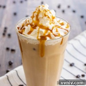 Creamy Caramel Iced Coffee Recipe You’ll Love 15 caramel iced coffee recipe topped with whipped cream and caramel syrup close up in glass