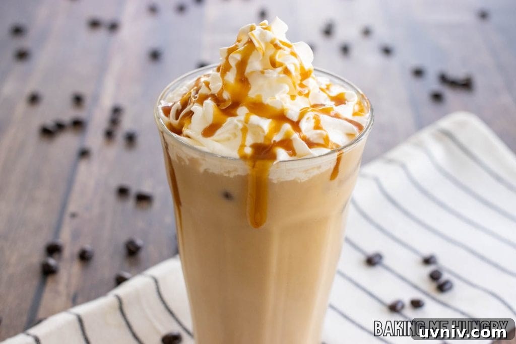 Creamy Caramel Iced Coffee Recipe You’ll Love 8 caramel iced coffee recipe topped with whipped cream and syrup in glass