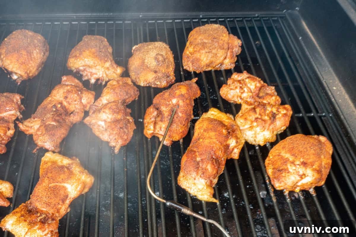 Juicy Smoked Chicken Thighs: Tender, Flavorful BBQ Recipe 10 cooked chicken thighs on smoker