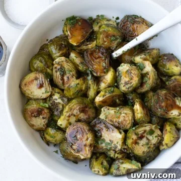 A bowl of burnished roasted Brussels sprouts glazed with Balsamic.