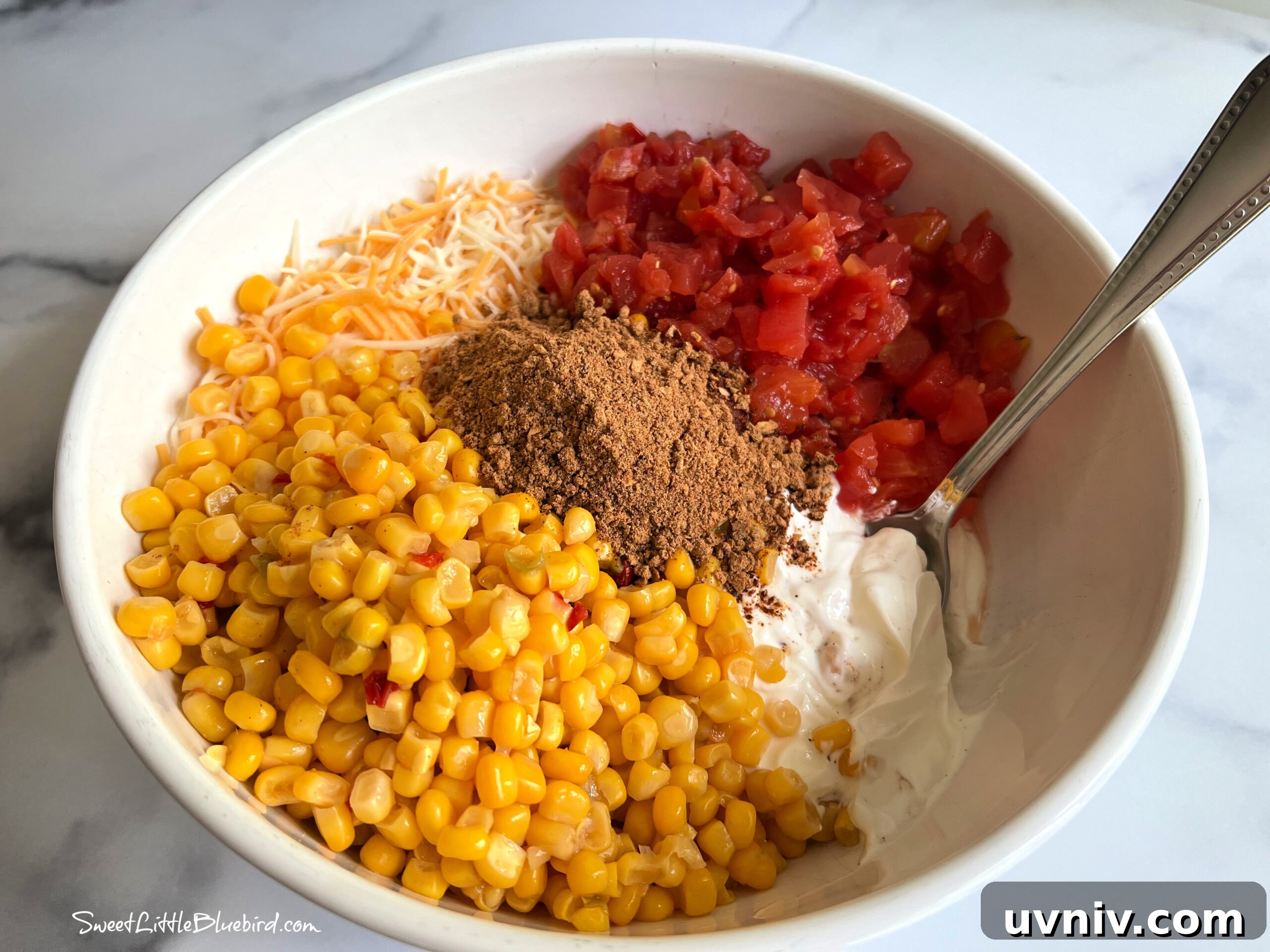 5-Ingredient Party Boat Dip Recipe for Quick Entertaining 4 This photo shows all the ingredients in a bowl, ready to mix.