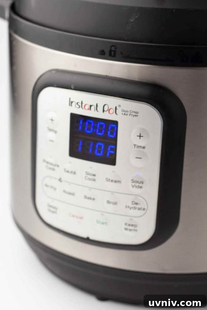 Instant Pot Yogurt Recipe: Make Yogurt with Sous Vide or Yogurt Mode 7 Instant pot being set to sous vide mode.