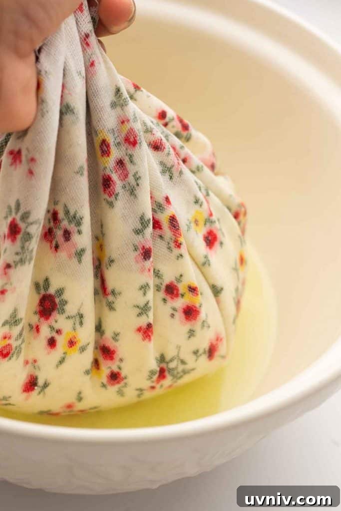 Instant Pot Yogurt Recipe: Make Yogurt with Sous Vide or Yogurt Mode 9 Whey being squeezed out of the yogurt.