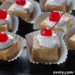 Root Beer Float Fudge Recipe: Creamy Soda-Infused Candy 21 pieces of root beer float fudge on cupcake liners, on a black tray