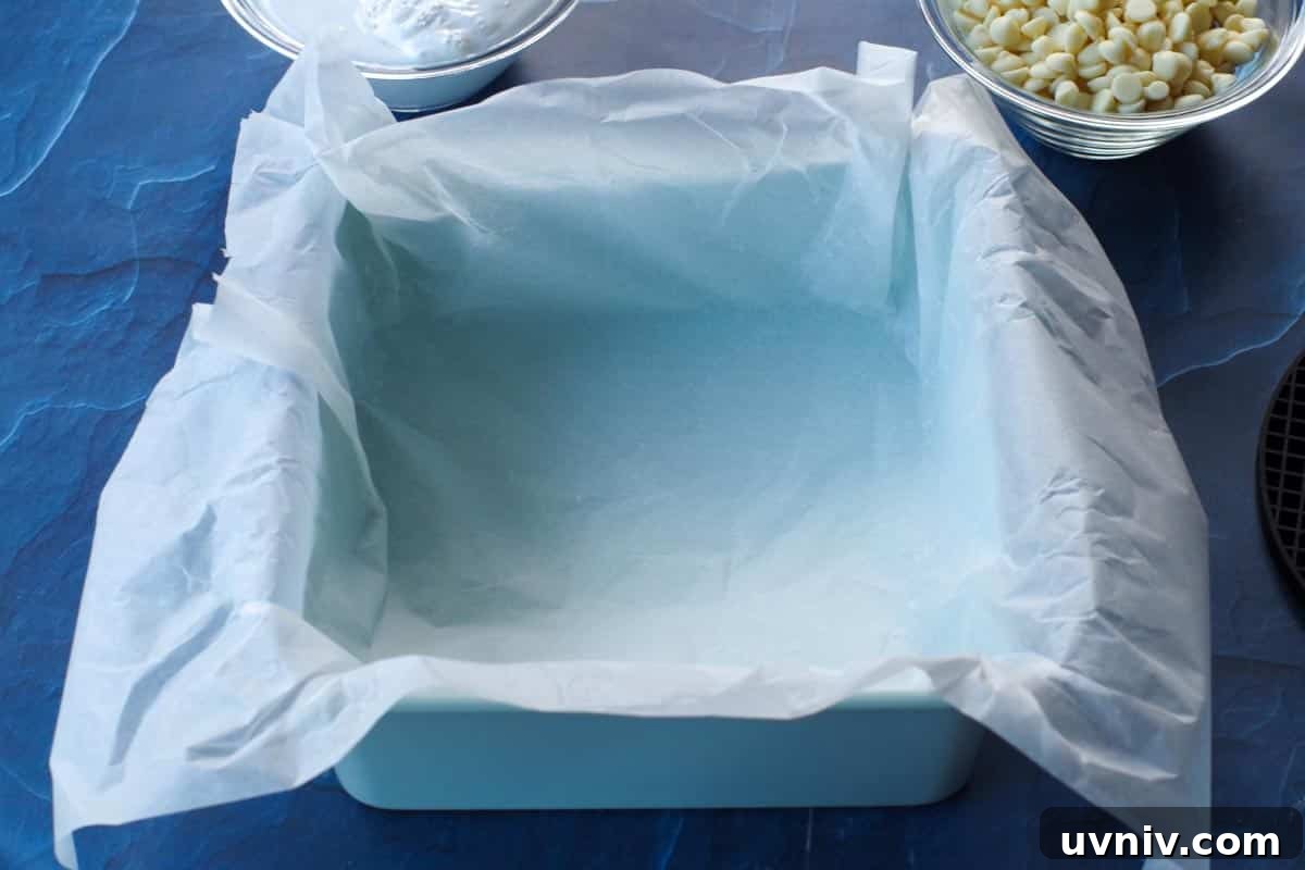 Root Beer Float Fudge Recipe: Creamy Soda-Infused Candy 6 pan lined with parchment paper