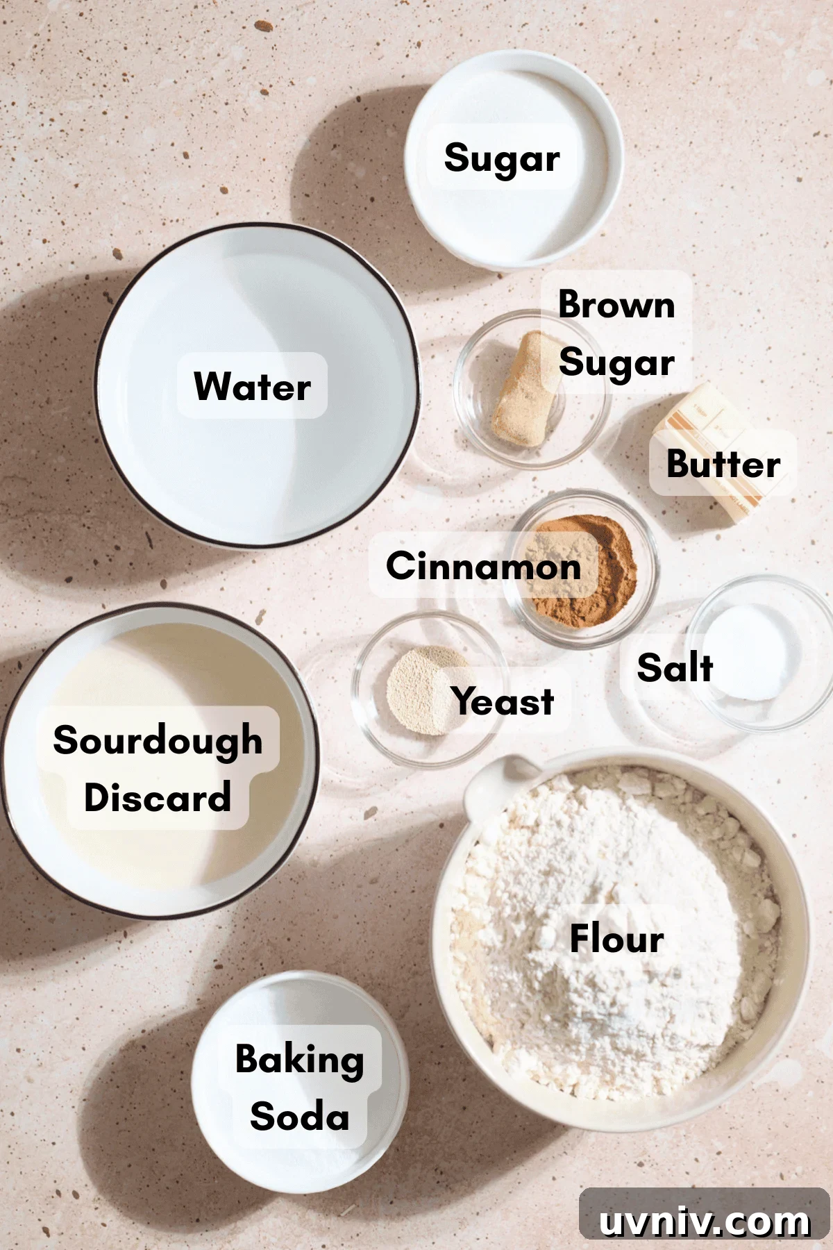 Ingredients for Sourdough Discard Cinnamon Sugar Pretzel Bites in small bowls.