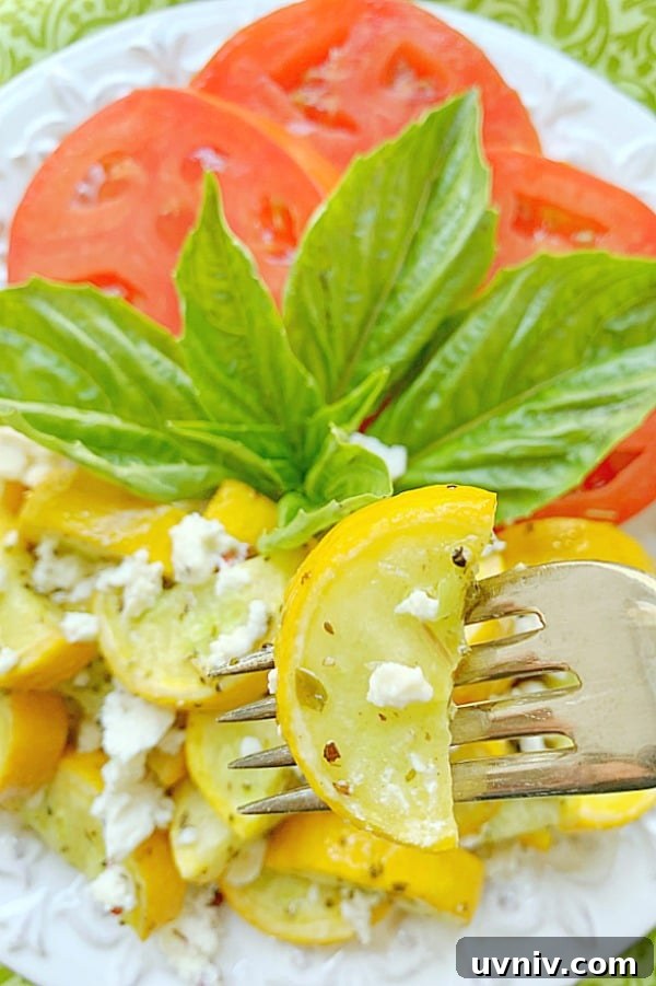 Crispy Air-Fried Summer Squash with Garlic and Parmesan 4 taking a bite of air fryer squash