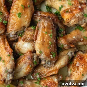 Crispy Garlic Butter Chicken Wings Recipe 14 Garlic Butter Wings in a white dish.
