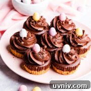 45 degree angle view at a plate filled with chocolate mini cheesecakes topped with mini eggs