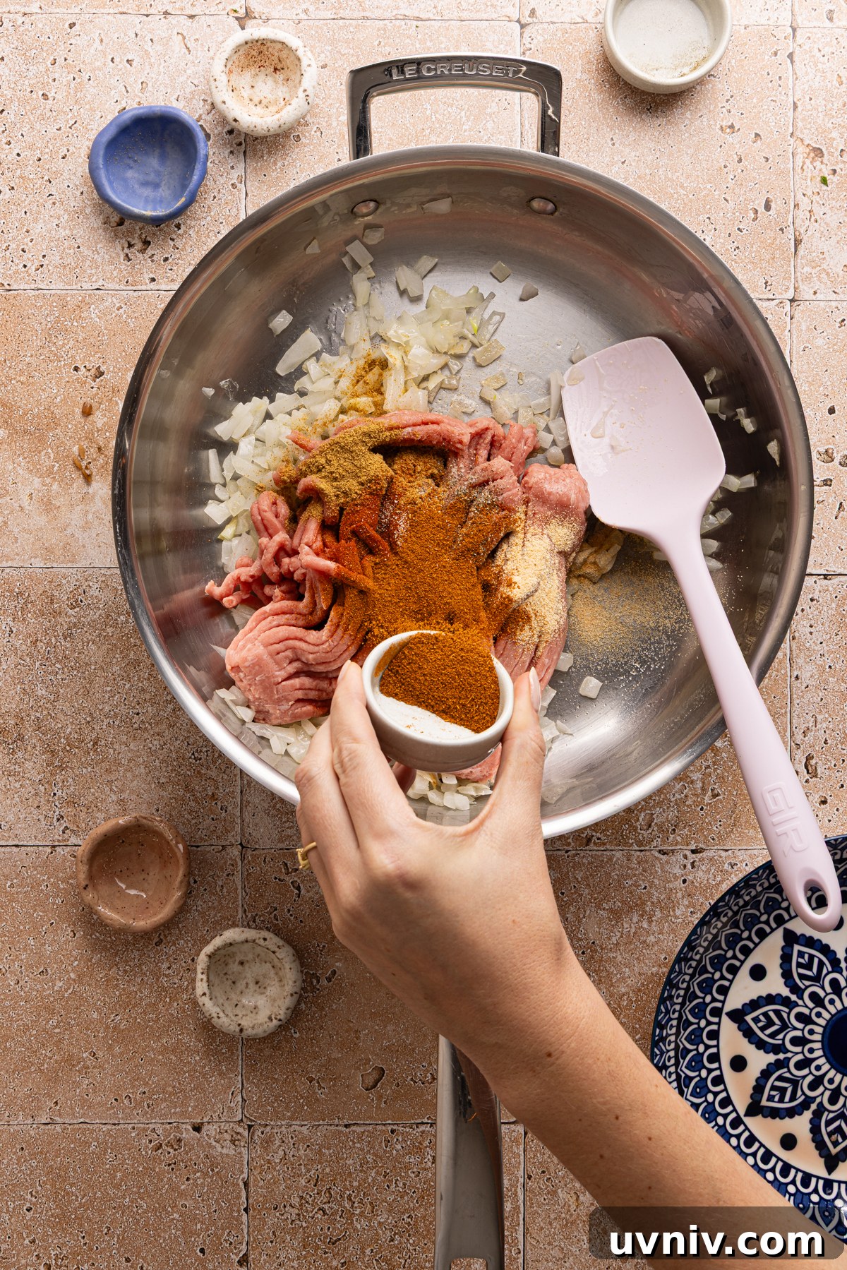 Cheesy Turkey Taco Skillet Dinner — One-Pan Weeknight Meal 5 A large skillet filled with sauteed onions, ground turkey and taco seasonings