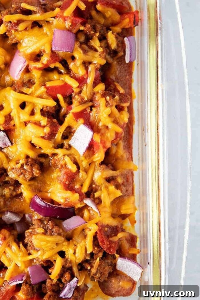 Low-Carb White Chicken Chili Recipe for Keto Diet 7 vertical overhead shot of keto chili dog casserole