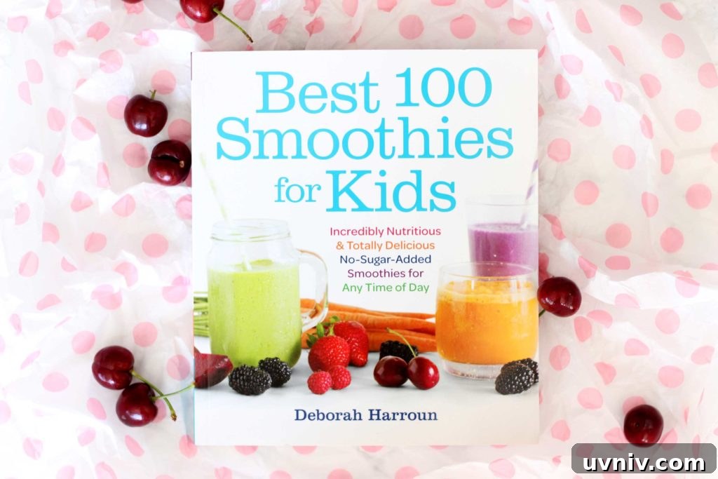 Creamy Cherry Banana Smoothie Recipe for Quick Energy 4 A close up of a book cover for the Best 100 Smoothies for Kids.