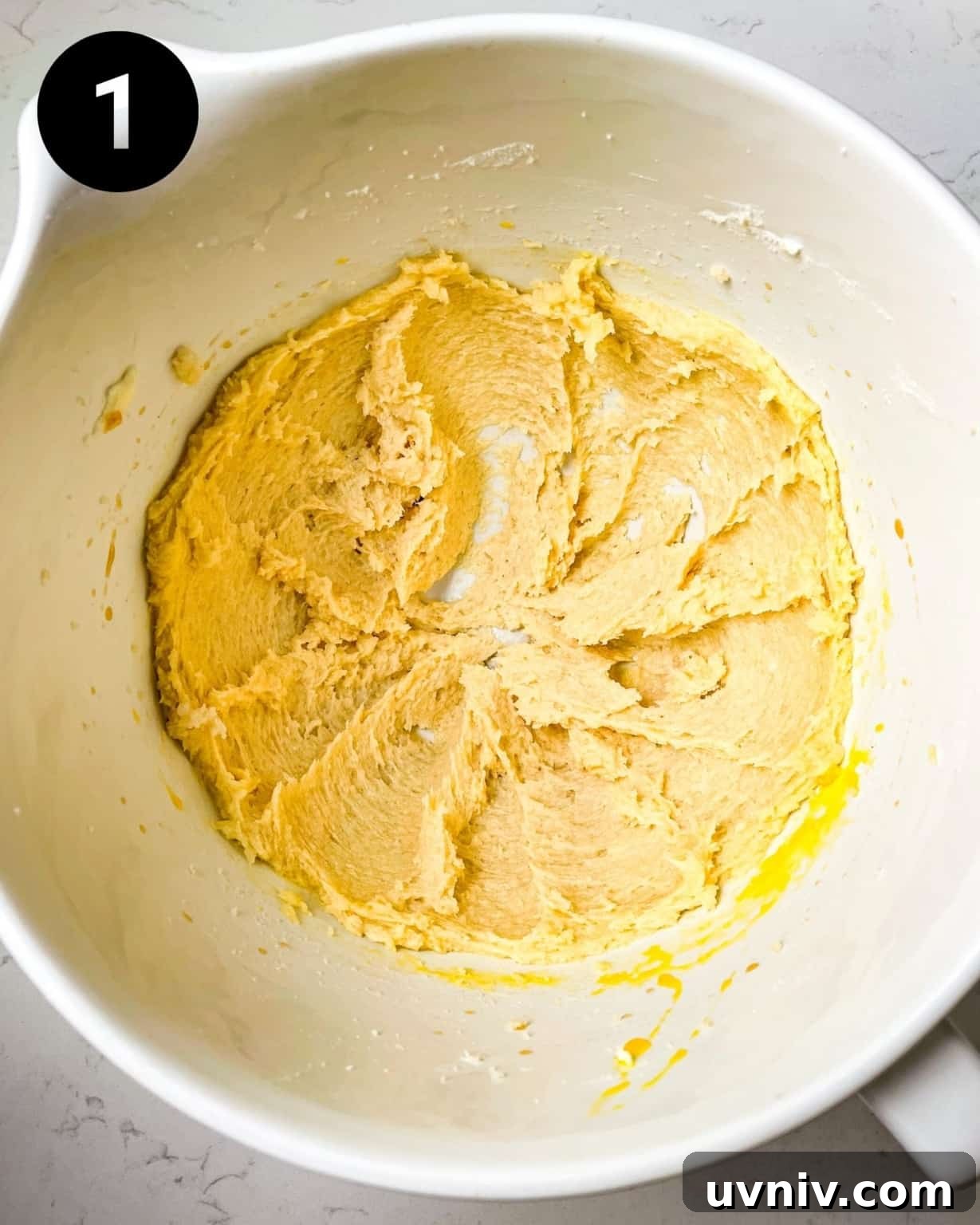 How to Make Perfect Snowflake Sugar Cookies for Winter Parties 5 butter and sugar creamed together in a mixing bowl.