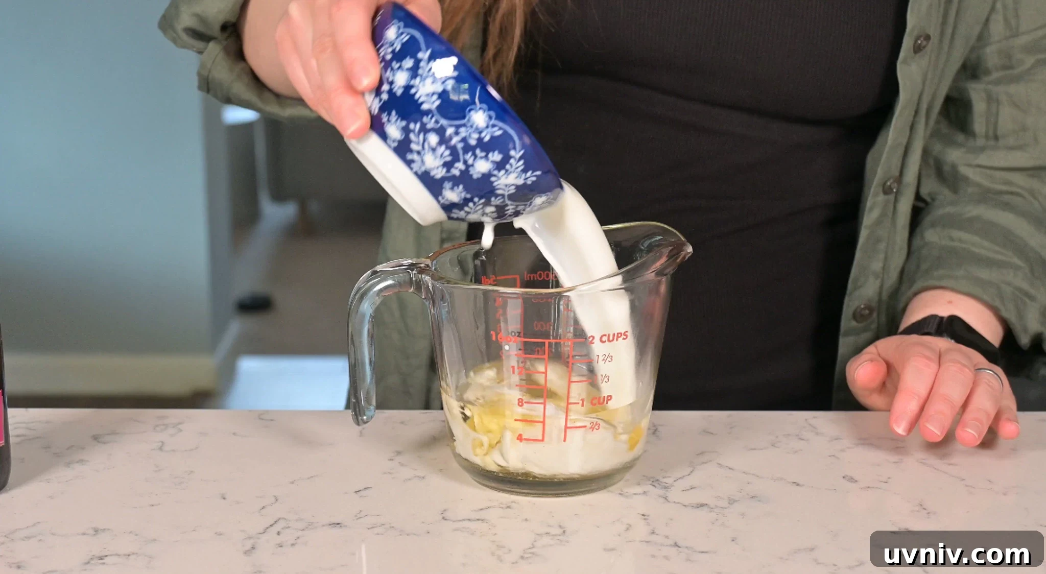 Classic Danish Æblekage Recipe — Rustic Apple Cake with Crumbs 17 Mixing together the wet ingredients for the cake.