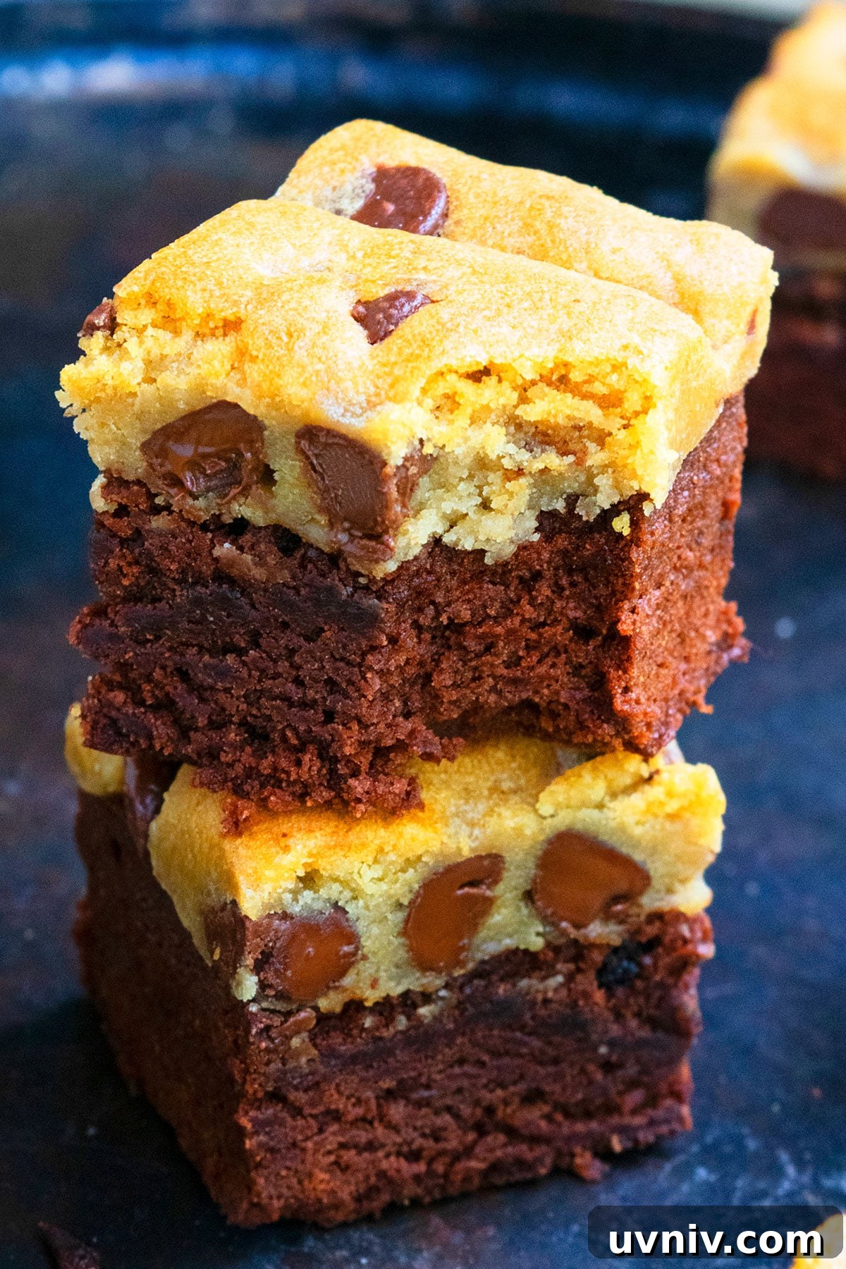 Brookie Recipe Using Brownie Mix: Chewy Cookie-Brownie Bars 2 Stack of Easy Brookies Recipe (Brownie Cookie Hybrid) on Dark Metal Tray.