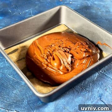 Brookie Recipe Using Brownie Mix: Chewy Cookie-Brownie Bars 8 Brownie batter poured in lined baking pan.