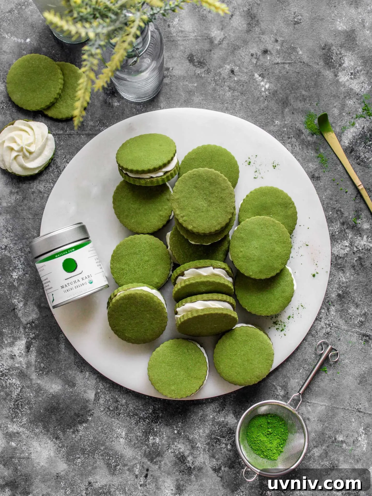 Matcha Cream Sandwich Cookies: Soft Green Tea Cookie Recipe 3 filled matcha sandwich cookies arranged on serving platter overhead image
