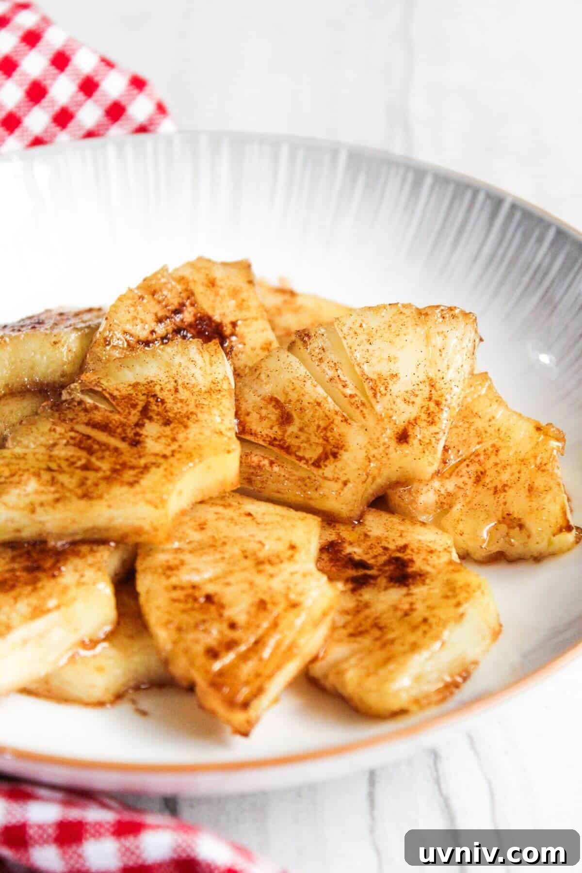 Crispy Caramelized Pineapple in the Air Fryer 12 A plate of air fried pineapples.