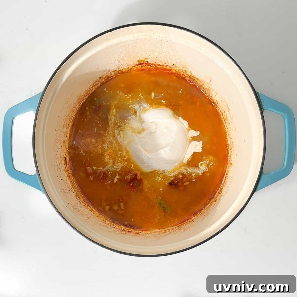 Coconut Milk Beef Curry Recipe: Rich, Creamy, Slow-Simmered 11 Adding coconut milk to the large saucepan.