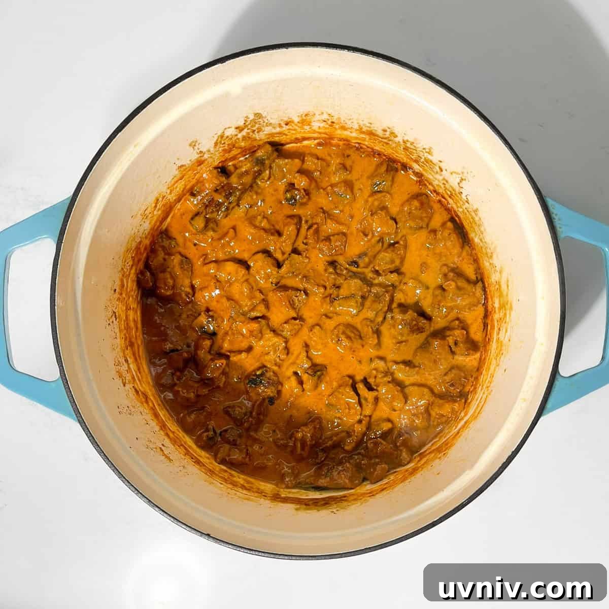 Coconut Milk Beef Curry Recipe: Rich, Creamy, Slow-Simmered 14 Completed beef curry with coconut milk in a large saucepan.