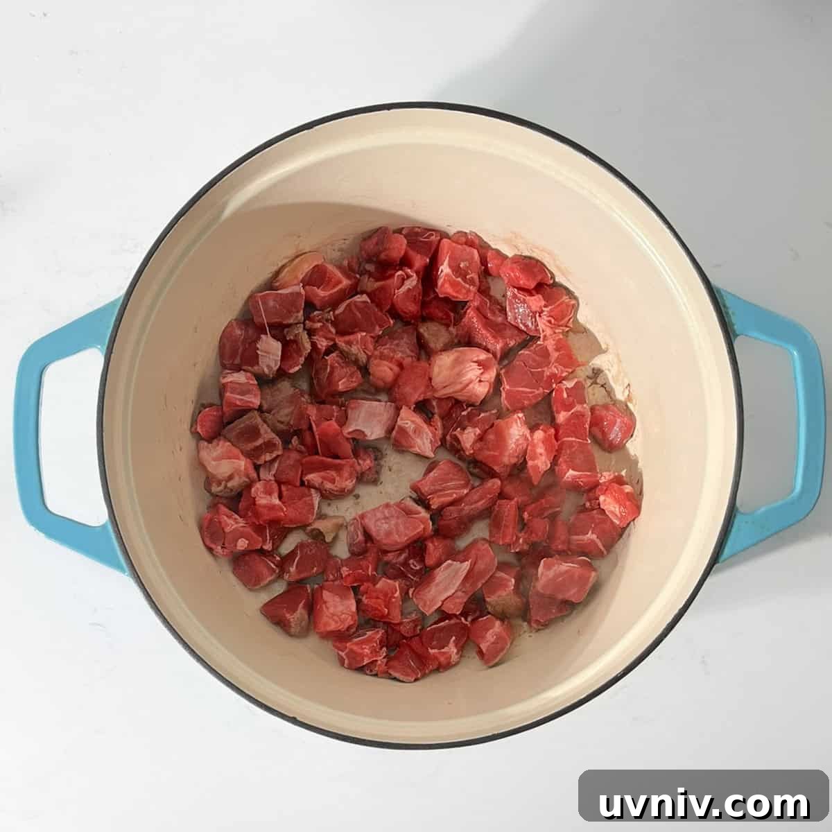 Coconut Milk Beef Curry Recipe: Rich, Creamy, Slow-Simmered 5 Browning the meat for the beef curry in a large saucepan.
