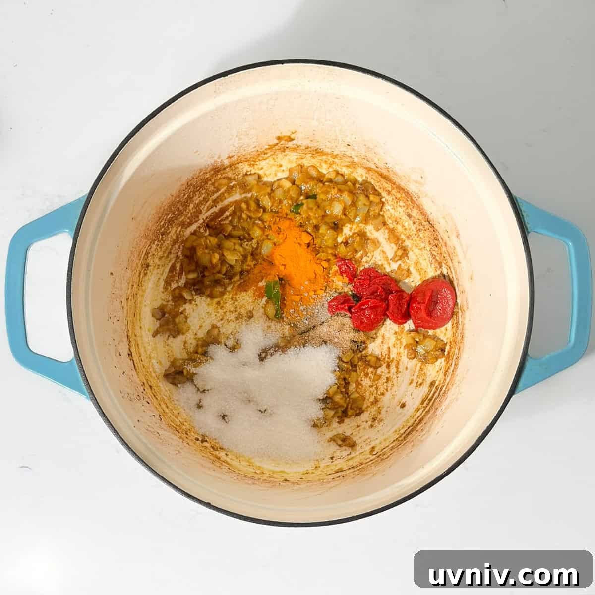 Coconut Milk Beef Curry Recipe: Rich, Creamy, Slow-Simmered 10 Adding all the spices to the saucepan for the beef curry.