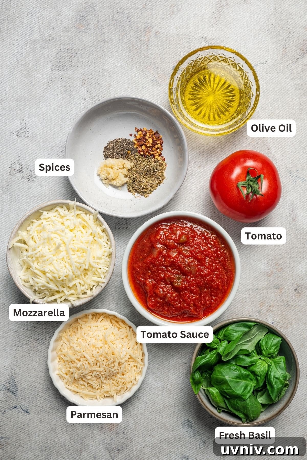 This deep dish pizza recipe with homemade herbed crust, tomatoes, and lots of melty cheese will bring Pizza Night to your kitchen each week. Ingredients for deep dish pizza.