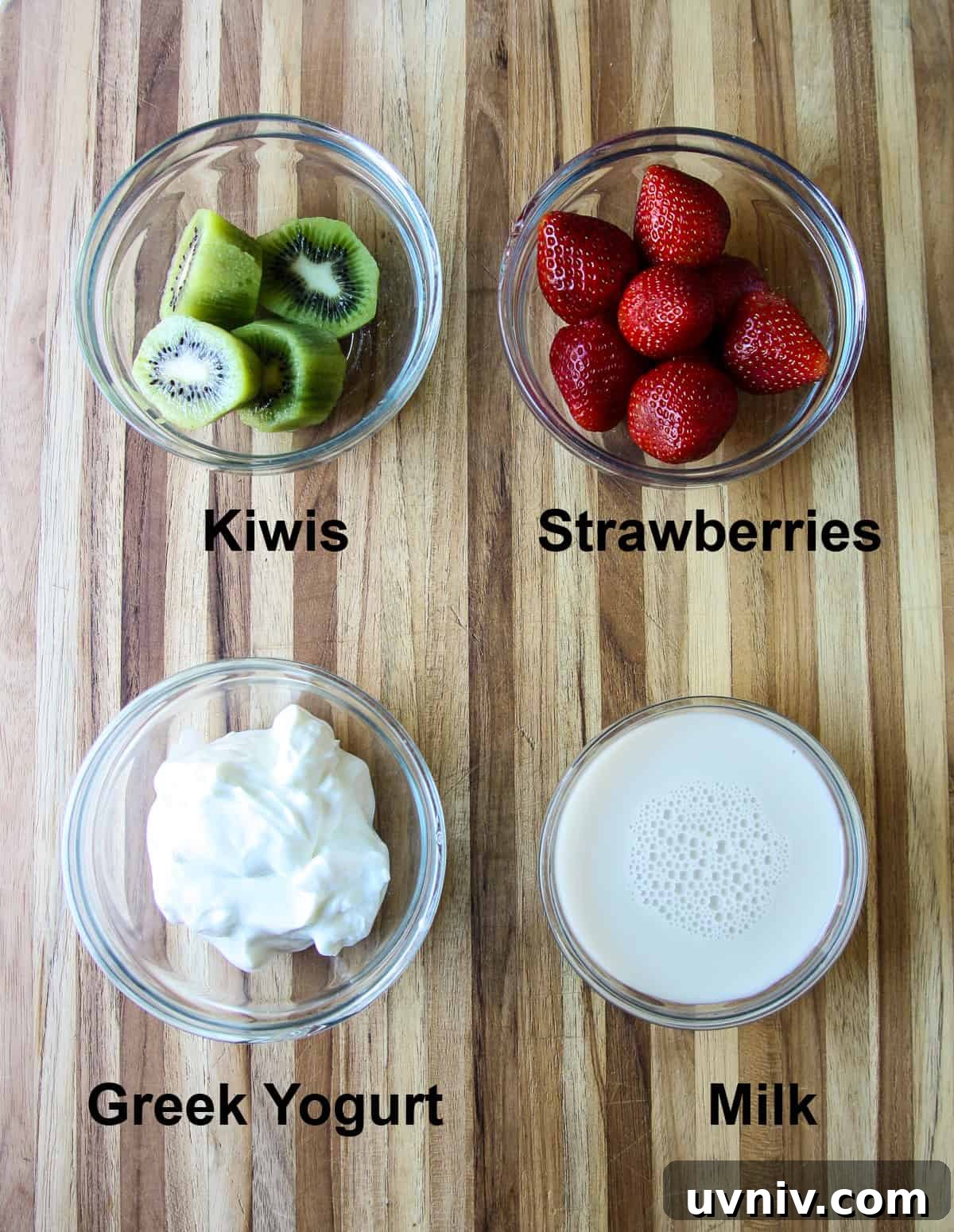 The four ingredients needed to make this recipe in glass bowls on a wooden board.