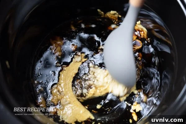 Slow Cooker Honey Mustard Chicken – Moist & Flavorful Recipe 3 slow cooker honey mustard chicken ingredients being stirred