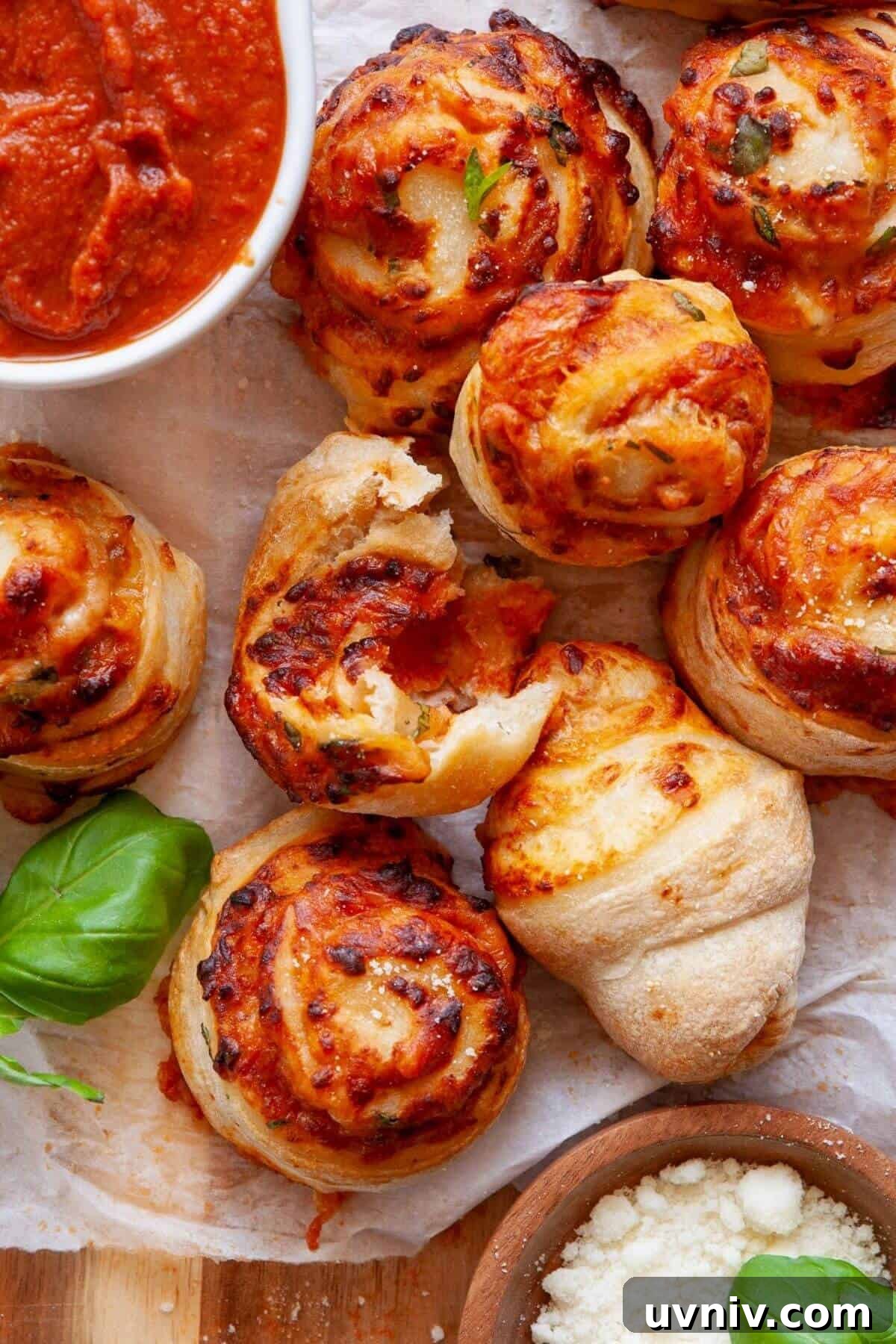 Crispy Air Fryer Pizza Rolls You Can Make at Home 2 Crispy homemade air fryer pizza rolls made with real pizza dough, melted mozzarella, and fresh basil served with marinara sauce.
