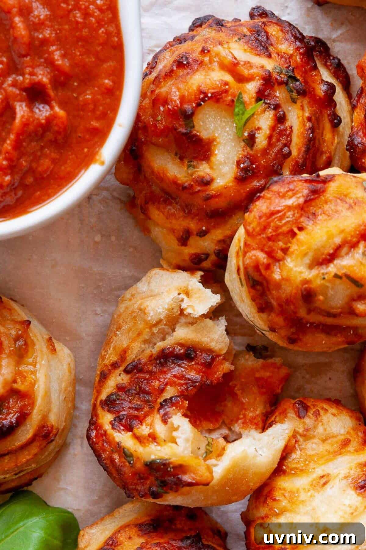 Crispy Air Fryer Pizza Rolls You Can Make at Home 11 Cheesy and crispy homemade air fryer pizza roll with golden crust and gooey melted mozzarella inside.
