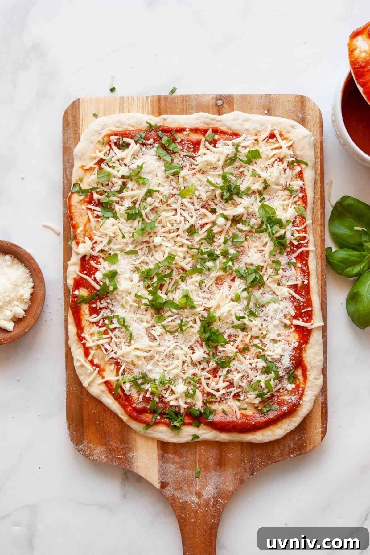 Crispy Air Fryer Pizza Rolls You Can Make at Home 6 Adding fresh basil on top of mozzarella and marinara before rolling homemade air fryer pizza rolls.