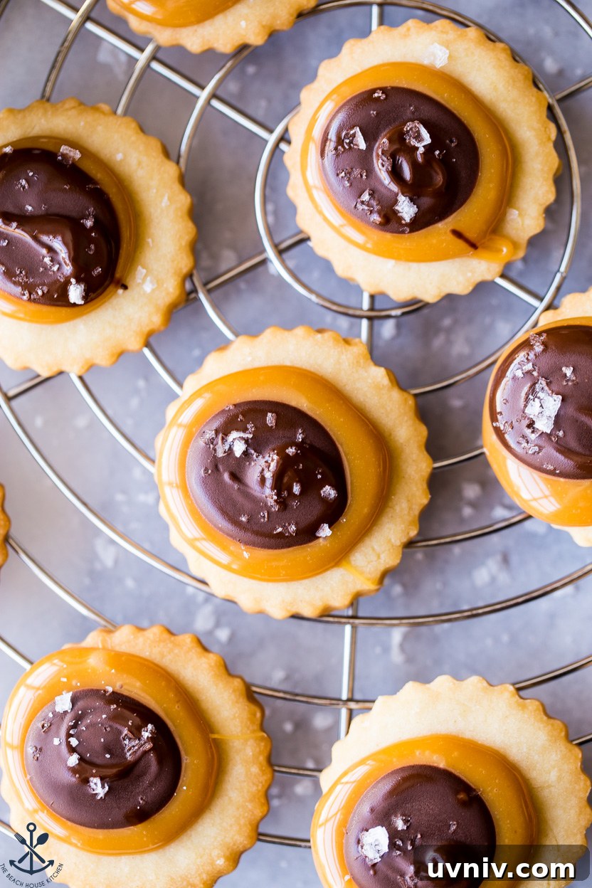 Twix Cookie Bars: Chewy Caramel Chocolate Treat Recipe 7 Up close overhead photo of Twix Cookies topped with sea salt