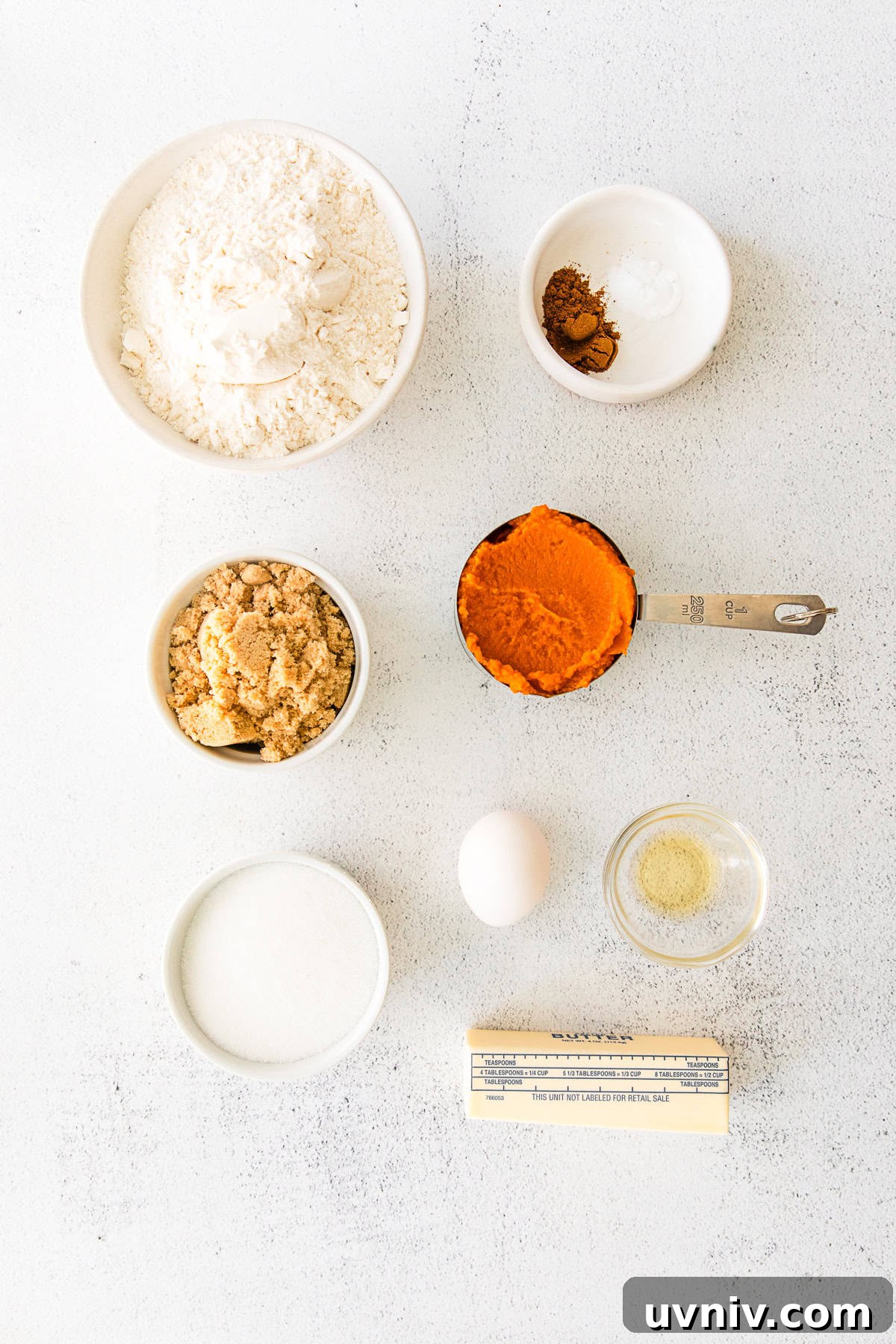 Soft Pumpkin Cookie Recipe for Moist, Fall-Ready Treats 3 Soft Pumpkin Cookies ingredients on a table.