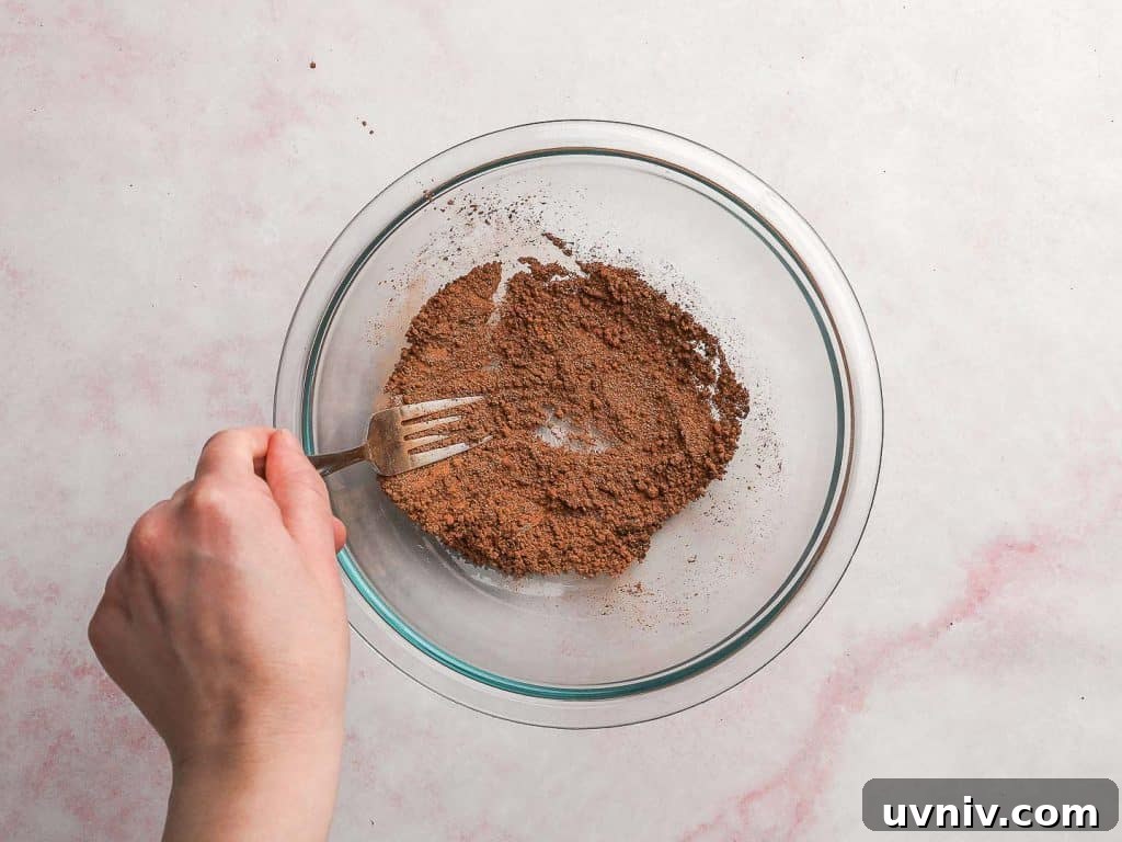 Mocha Oreo Trifle Dessert Recipe: Layered Coffee and Cookies 4 Whisking Together Dry Ingredients - Cocoa Sugar and Instant Coffee